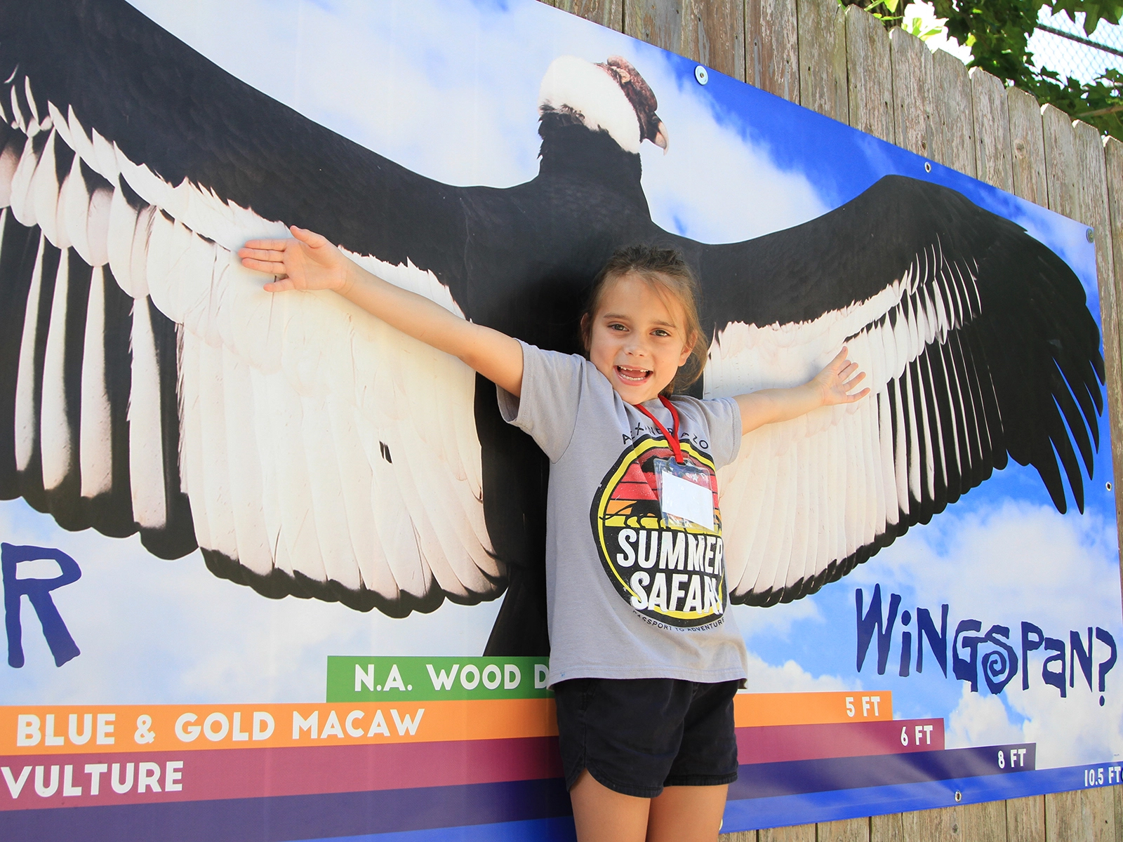 camper testing her wingspan