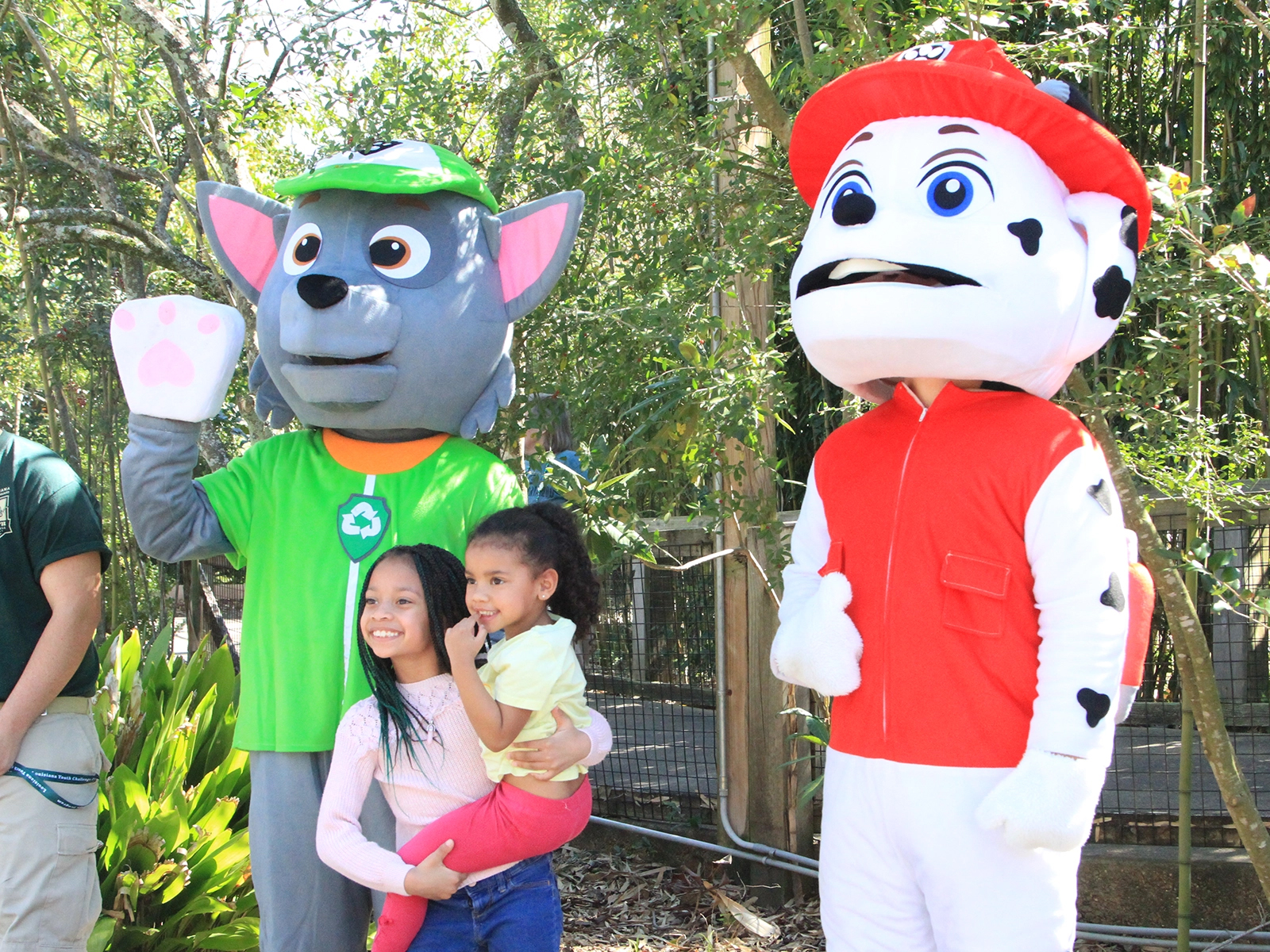 guests taking picture with costume character