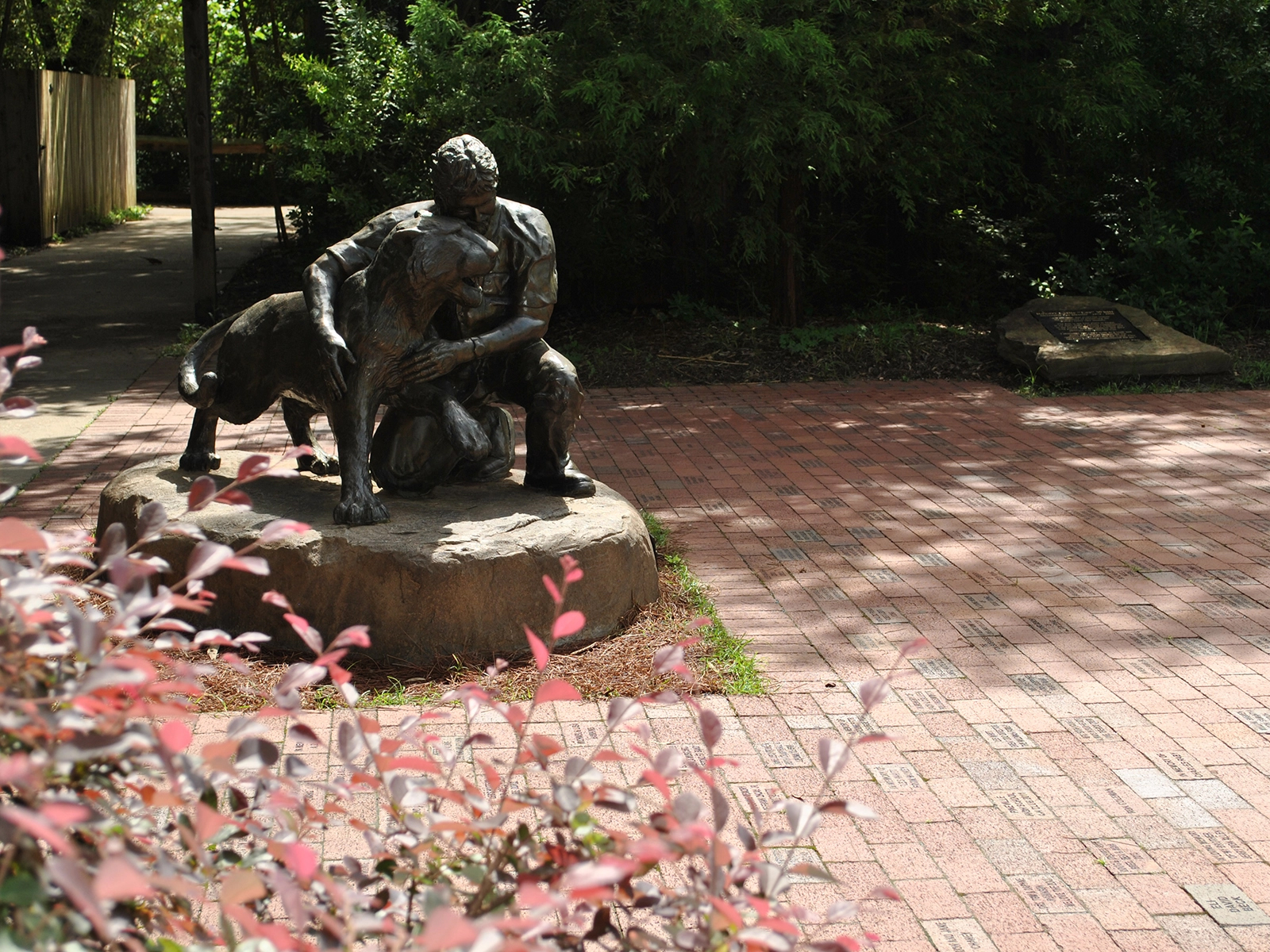 engraved brick area with statue