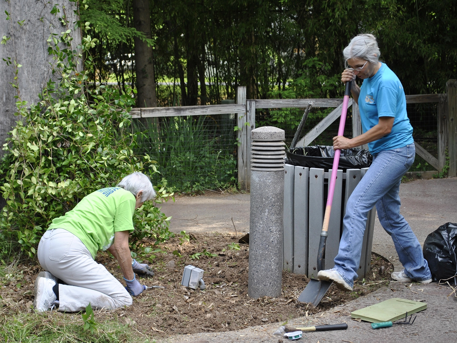 volunteers assisting with grounds maintenance