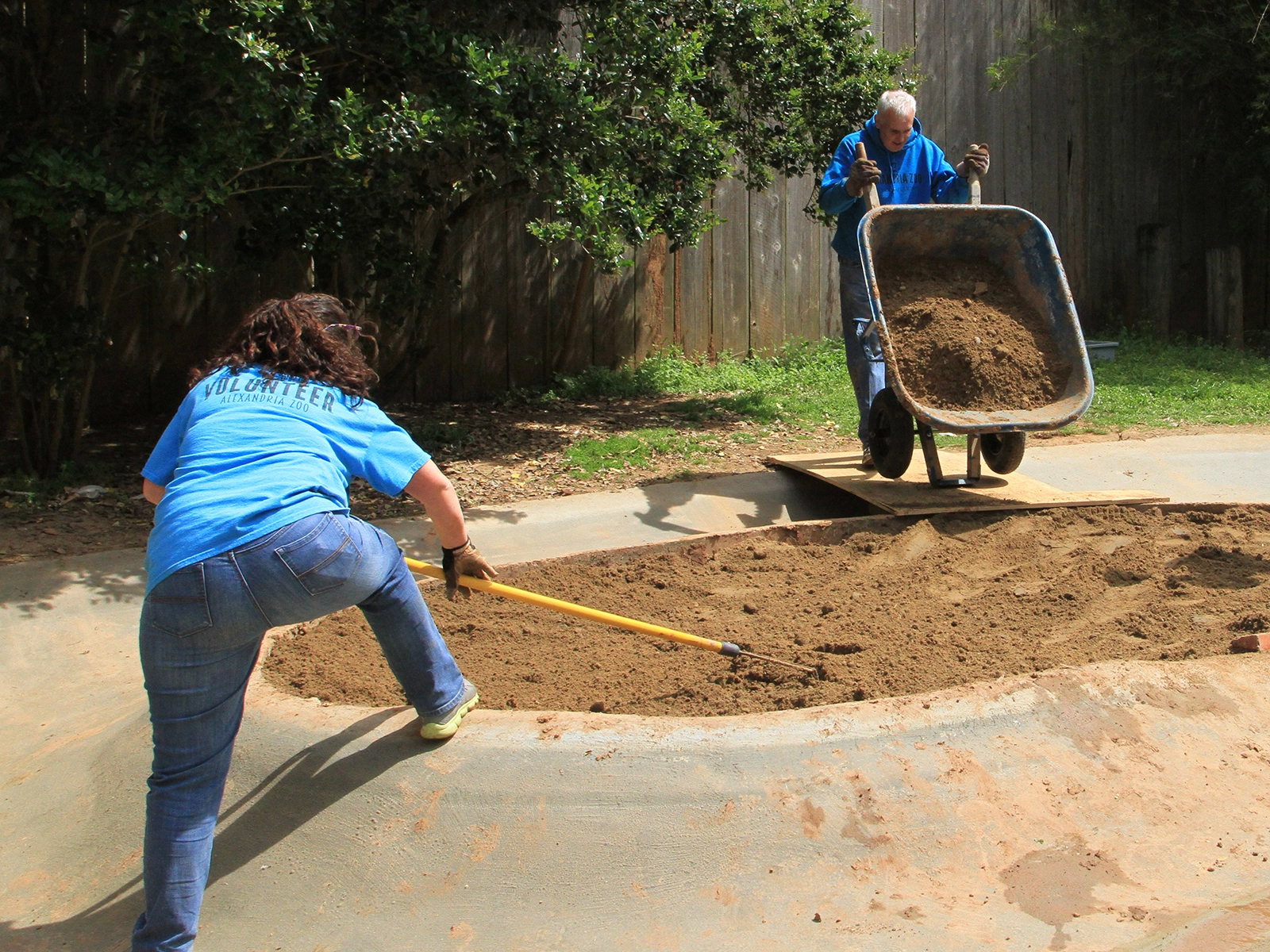 volunteers assisting with a grounds project