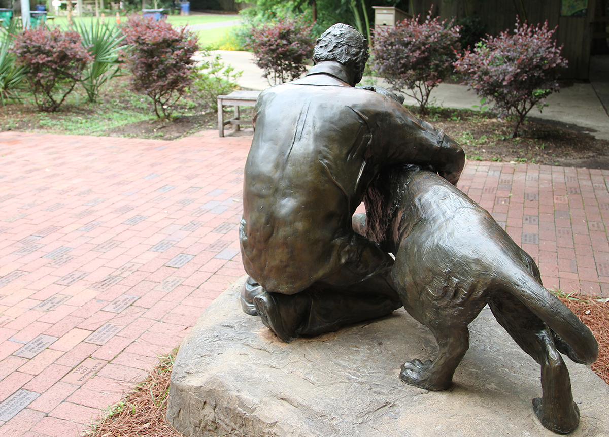 engraved bricks and statue