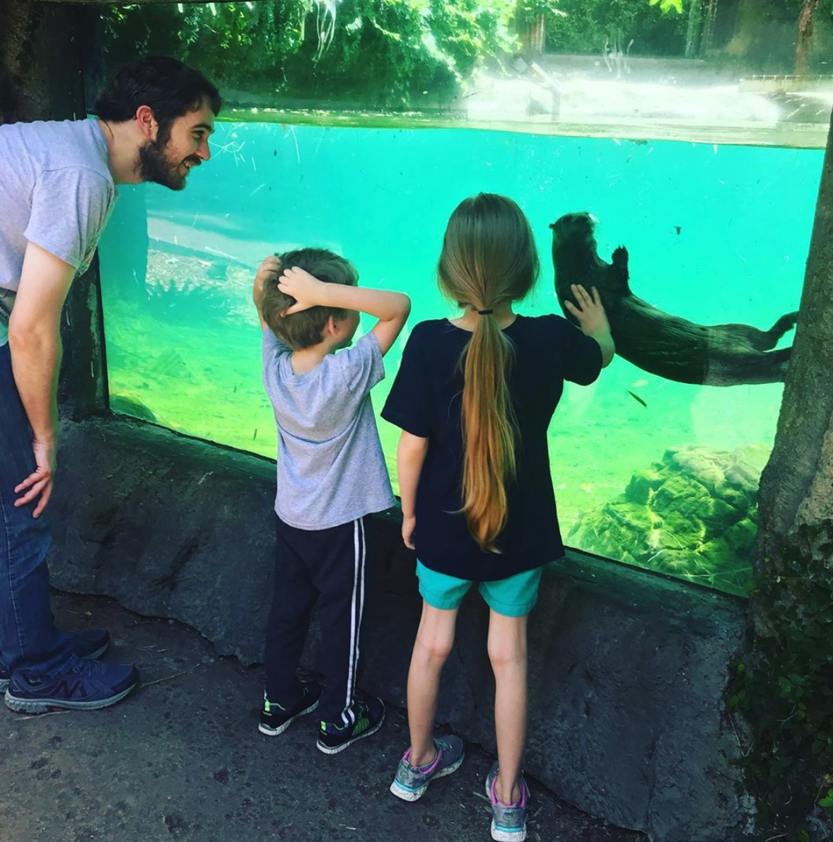 family and river otter